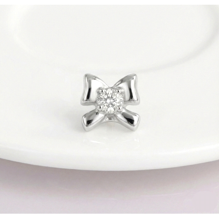 Pendientes lazo oro 18 kt diamantes