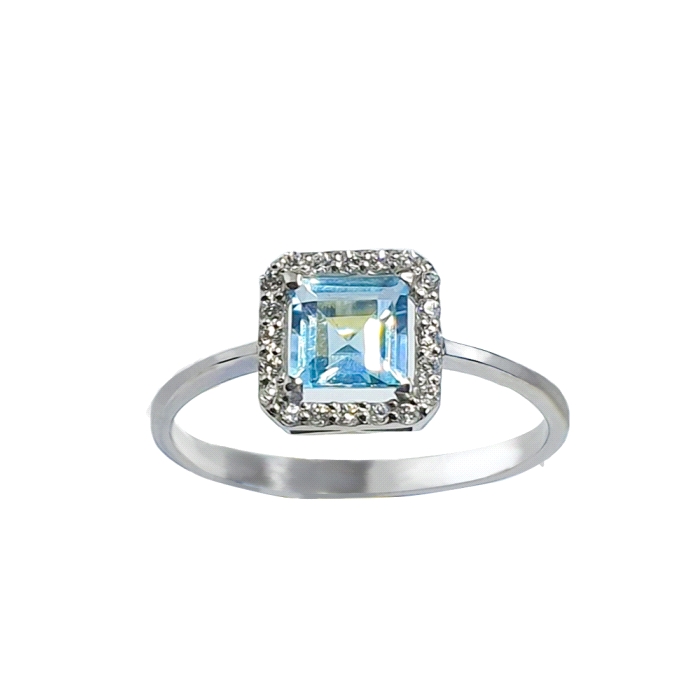 Anillo orla topacio azul oro 18 kt 0.10 ct diamantes