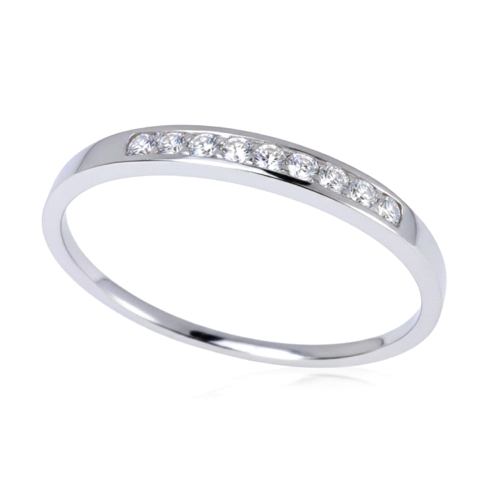 Anillo media alianza oro 18 kt diamantes 0.14 ct