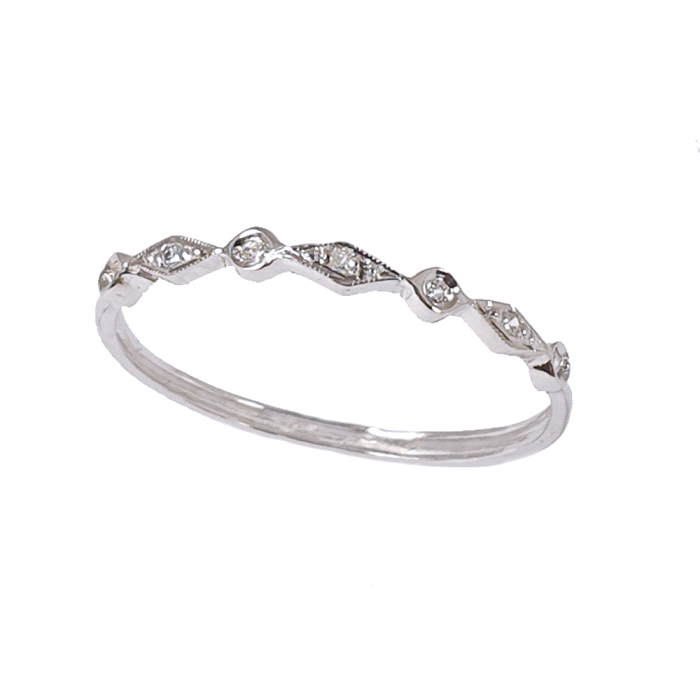 Anillo media alianza oro 18 kt diamantes 0.03 ct